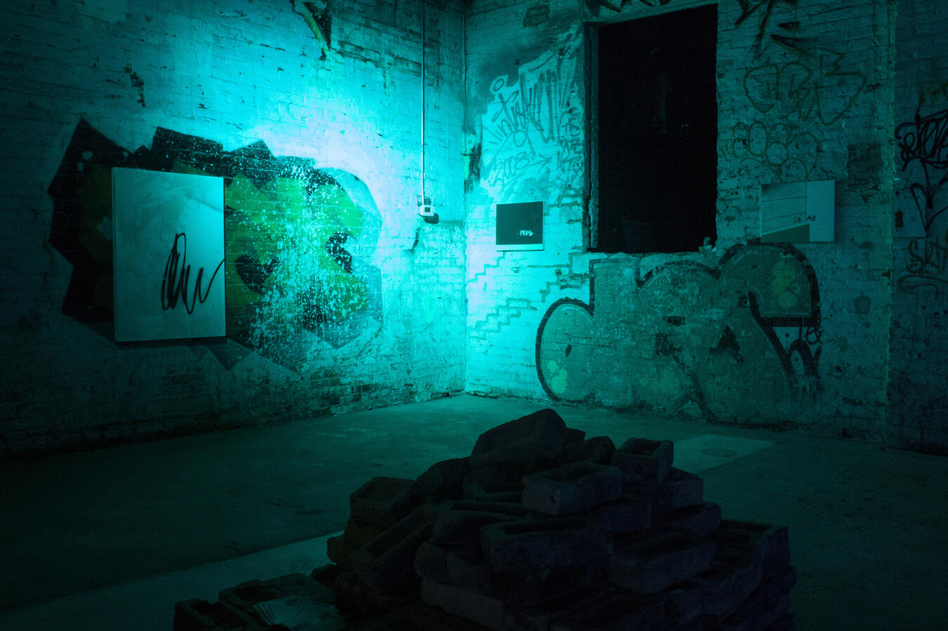 Left to right: &quot;Pink&quot; Aerosol paint, gesso, and oil on canvas. 42 x 30 inches. 2014, &quot;PEVIS&quot; Oil and acrylic on canvas. 20 x 16 inches. 2014, &quot;SAMO&quot; Oil on canvas. 20 x 16 inches. 2014.