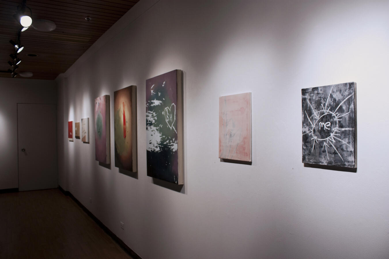 Right to left: "Me" Acrylic and oil bar on canvas. 11 x 14 inches. 2014, "Untitled" Acrylic and aerosol paint on canvas. 11 x 14 inches. 2014, "I" Oil on canvas. 36 x 24 inches. 2014.